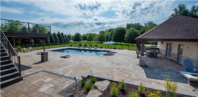 Achieving Unity with a Kitchen, Pool, and Firepit