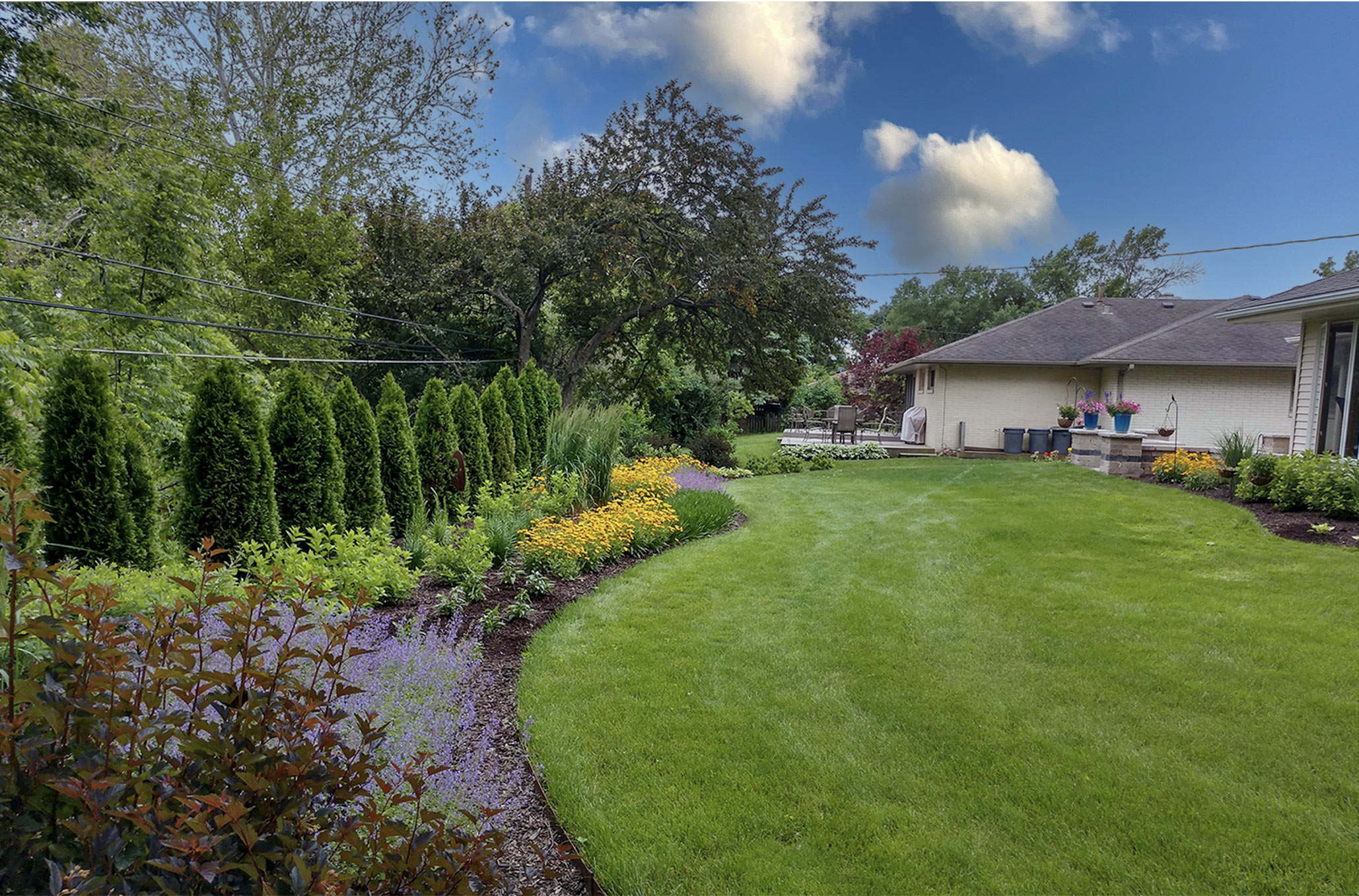 Achieving unity with a kitchen, pool, and firepit